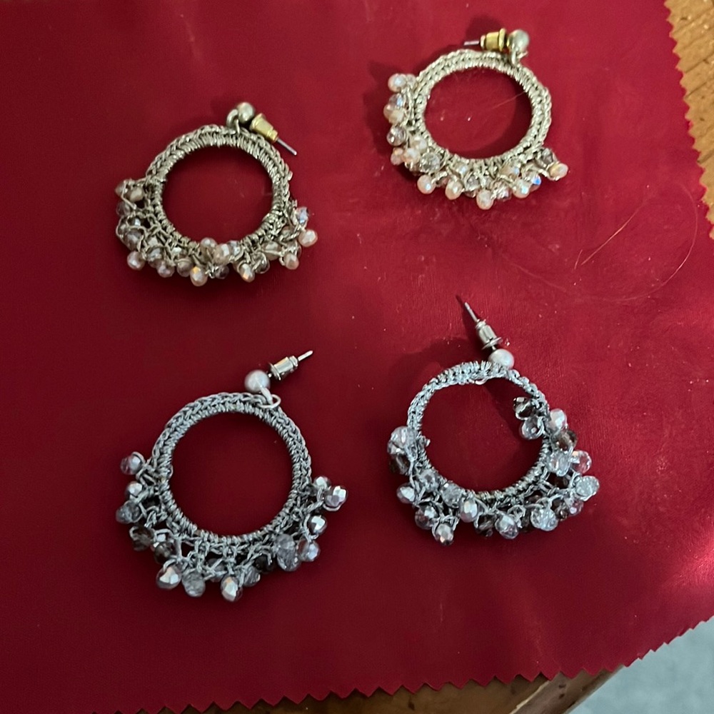Two pairs earrings. Pierced.